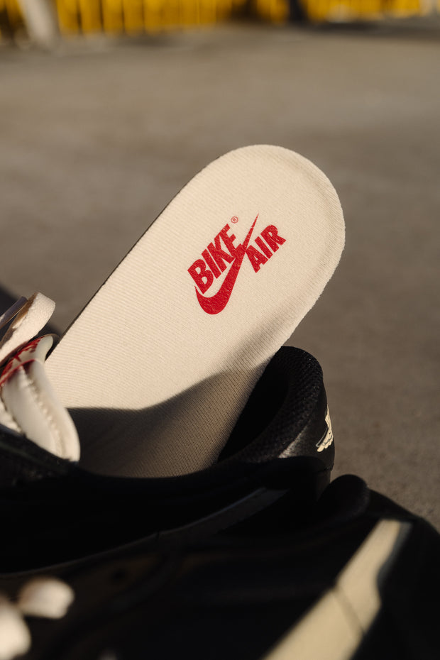 Nike "Bike Air" insole close-up — vintage black sneaker insert with red logo