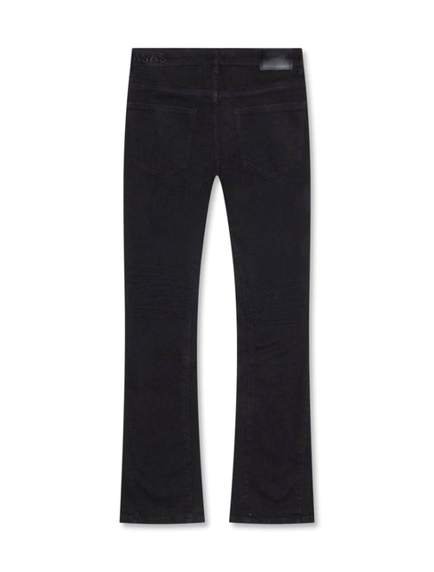 Back view of black denim Valabasas Mr. Stacked jeans featuring a slim fit, belt loops, and branded leather patch.