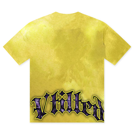Vtilted LEFT ALONE tee in yellow mineral wash cotton featuring a prominent purple gothic logo across the bottom.