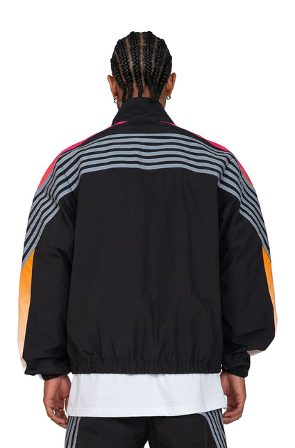 Back view of an EPTM Proxy jacket in black, featuring grey striped patterns, pink accents, and orange sleeve panels.