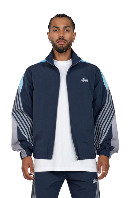 EPTM Proxy track jacket in navy with light blue shoulder panels, grey striped sleeve details, and a front zip closure.