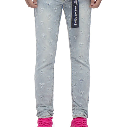 Light blue Valabasas Caelune jeans featuring an all-over white embroidered brand logo pattern and a hanging tag.