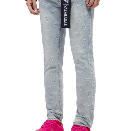 Valabasas Caelune jeans in light blue denim featuring an all-over white embroidered triangular monogram logo pattern.