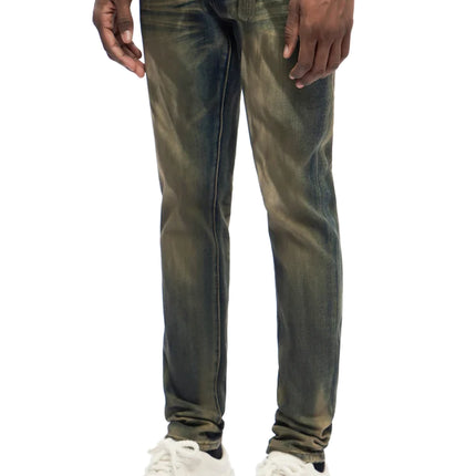 Trnchs Monarch skinny fit jeans featuring a faded vintage olive and blue wash in a slim denim silhouette.
