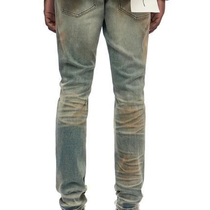 Trnchs Monarch skinny fit jeans in a dark blue wash featuring a faded vintage denim texture and slim silhouette.