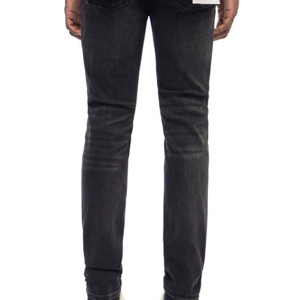 Back view of Trnchs Monarch skinny fit jeans in washed jet black denim with a slim-cut, tapered leg silhouette.