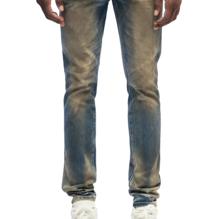 Trnchs Monarch skinny fit jeans featuring a dark blue finish with a distinct dirty wash and vintage denim texture.