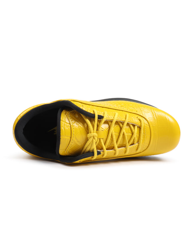 Nike Air Max Goadome Low in vivid sulfur yellow featuring a croc-embossed leather upper and black inner lining.