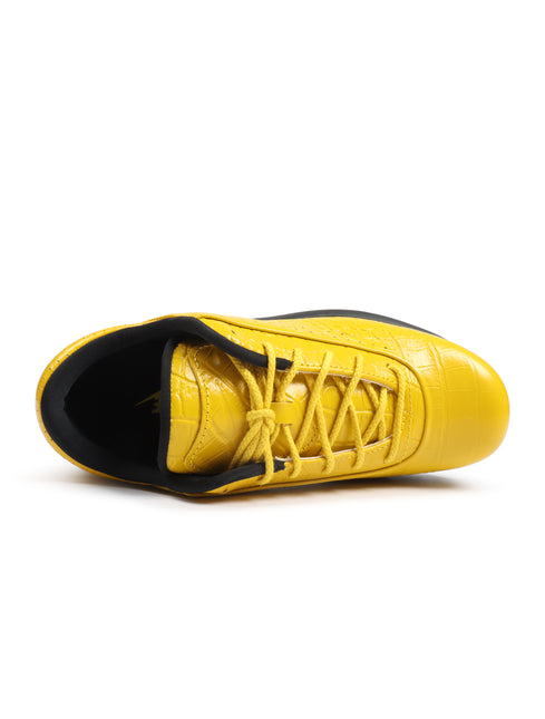 Nike Air Max Goadome Low in vivid sulfur yellow featuring a croc-embossed leather upper and black inner lining.