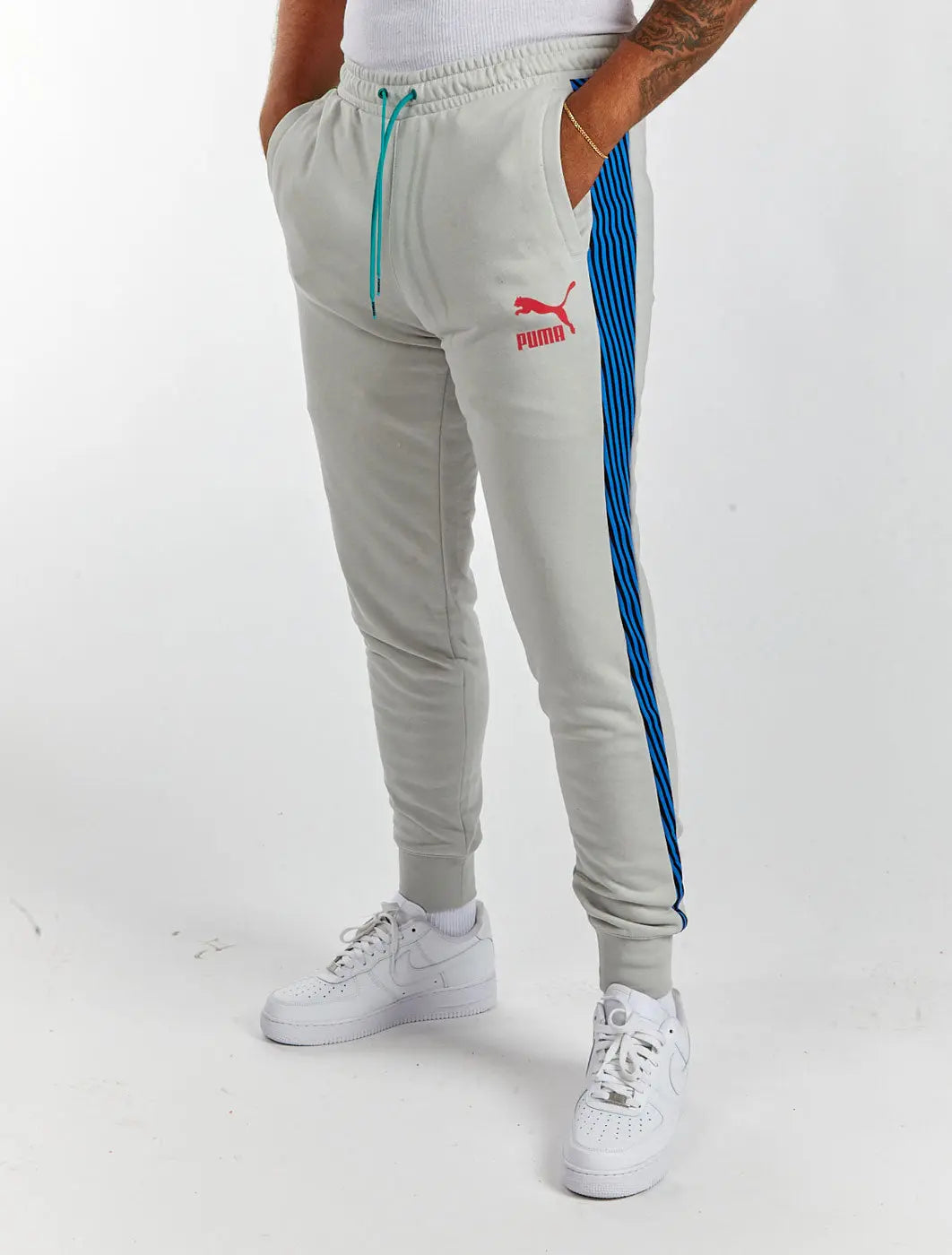 PUMA Knitted Pants Gradient Logo Graphic Print Men Grey Track Pants - Buy  PUMA Knitted Pants Gradient Logo Graphic Print Men Grey Track Pants Online  at Best Prices in India | Flipkart.com