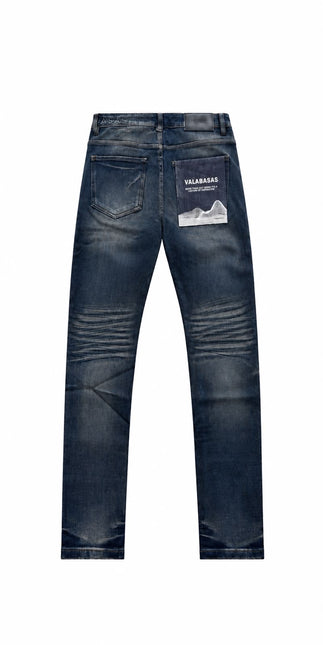 Valabasas Mr. Flex dark blue waxed skinny jeans with a graphic print pocket and distressed texture on the back view.