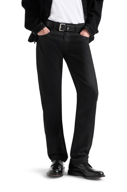7 For All Mankind Volcano straight leg jeans in a classic solid black denim finish worn with a black leather belt.