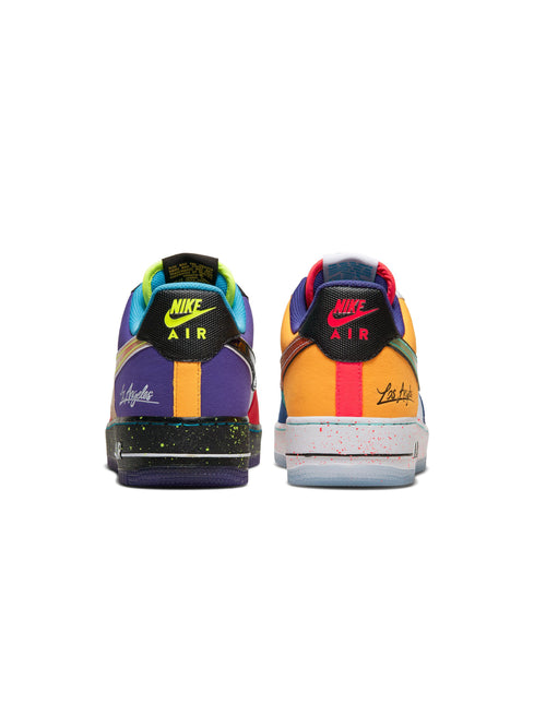 Rear view of Nike Air Force 1 Low What The LA sneakers featuring vibrant multicolor suede panels and speckled soles.