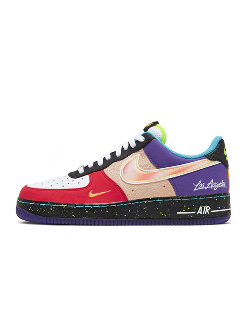 Nike Air Force 1 Low What The LA sneaker featuring a multicolored patchwork suede and leather upper on a black sole.