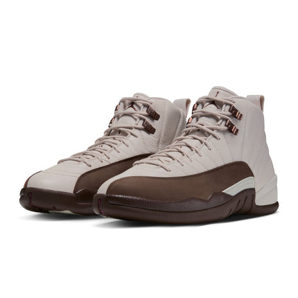 Air Jordan 12 Retro sneakers in light orewood brown leather with cocoa brown nubuck overlays and metallic accents.