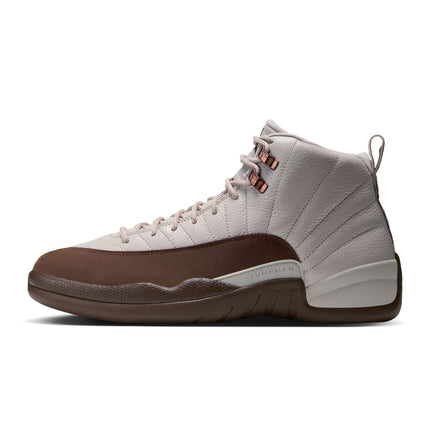 Air Jordan 12 Retro in light orewood brown and cacao wow featuring pebbled leather, suede overlays, and metallic eyelets.