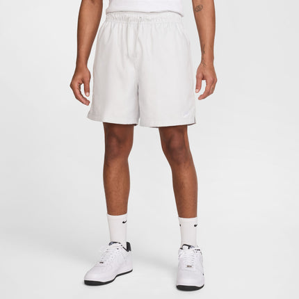Pantalones cortos Nike Club Woven para hombre - Polvo fotón/blanco
