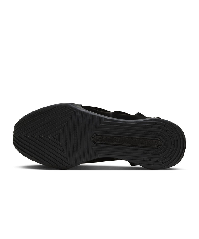 A black shoe sole viewed from the bottom, featuring a textured tread pattern and a debossed brand name that reads 'K-Swiss'.