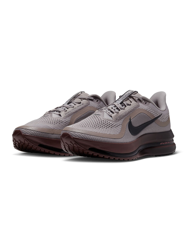 Nike Pegasus Premium running shoes in college grey mesh with black swoosh branding and a dark redwood foam midsole.