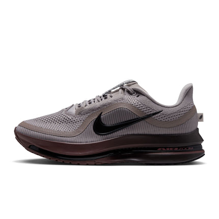 Nike Pegasus Premium running shoe in college grey mesh with a black swoosh and deep brown midsole and outsole.