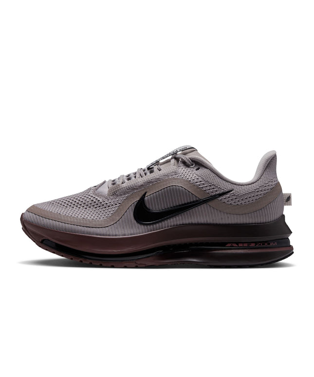 Nike Pegasus Premium running shoe in college grey mesh with a black swoosh and deep brown midsole and outsole.