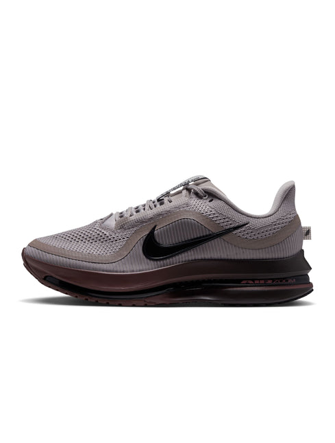 Nike Pegasus Premium running shoe in college grey mesh with a black swoosh and deep brown midsole and outsole.