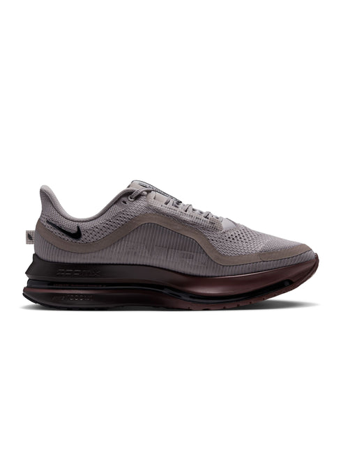 Nike Pegasus Premium sneaker in College Grey and Light Redwood, featuring a textured knit upper and ZoomX foam sole.