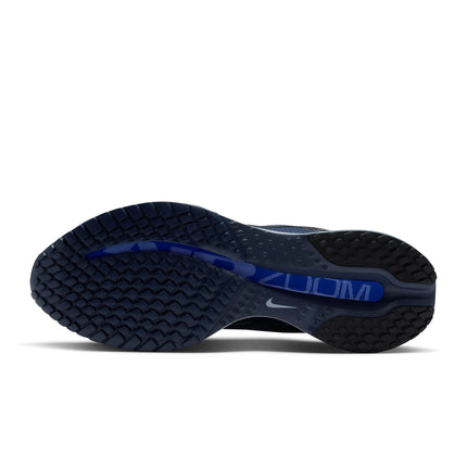 Bottom view of Nike Mens Pegasus Premium running shoe in smokey blue with a durable textured rubber traction sole.