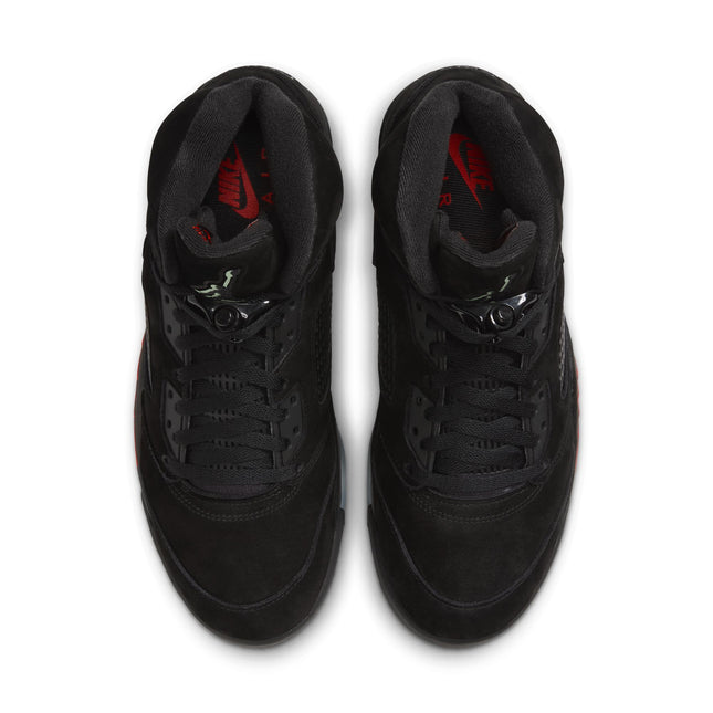 Top-down view of Air Jordan 5 Retro sneakers featuring a premium black suede upper and red Nike Air branded insoles.