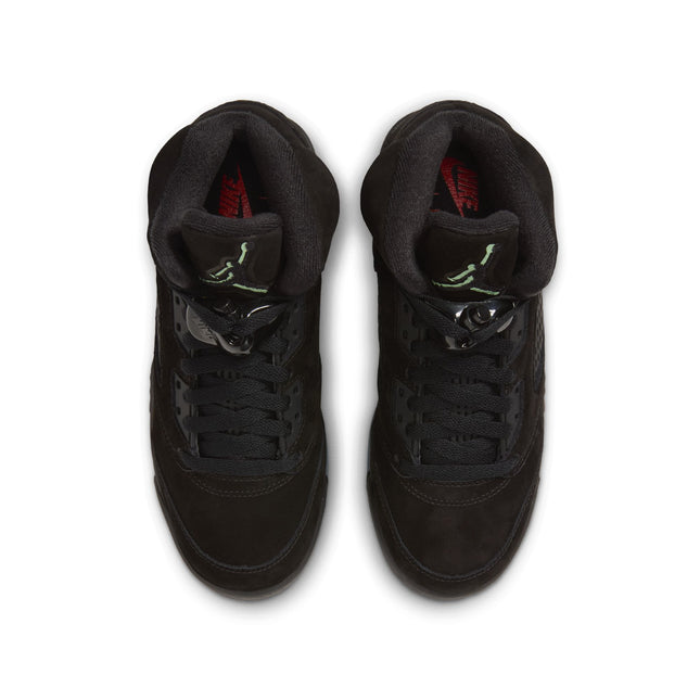 Air Jordan 5 Retro high-top sneakers in black suede, seen from above with black laces and green Jumpman tongue logos.