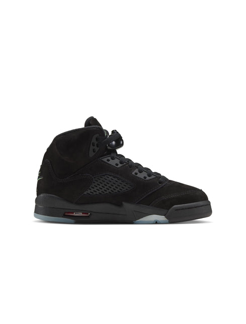 Side view of an all-black suede Air Jordan 5 sneaker with a translucent icy outsole.