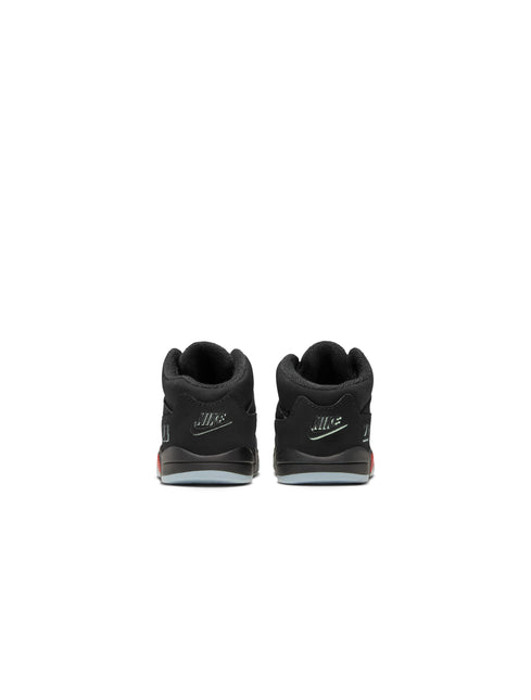 Back view of Air Jordan 5 Retro toddler shoes in black suede with glow-in-the-dark Nike Air logos on the heels.