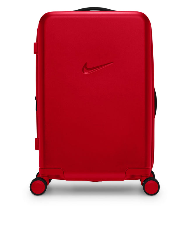 Nike unisex carry-on luggage in university red featuring a sleek hardshell finish and a molded black Nike swoosh logo.