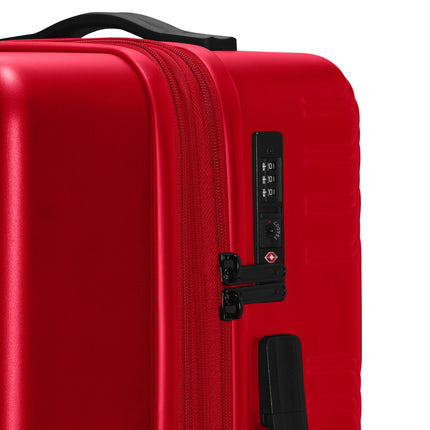 University Red hard-shell Nike carry-on luggage with a black top handle, dual-zipper closure, and TSA-approved lock.