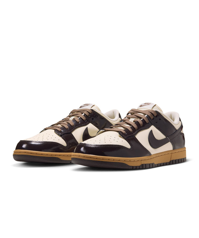 Nike Dunk Low Retro in shadow brown patent leather overlays and coconut milk leather panels with gum rubber outsoles.