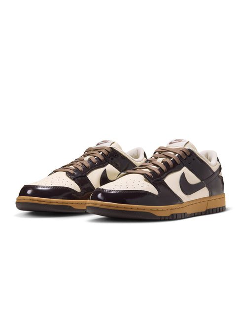 Nike Dunk Low Retro in shadow brown patent leather overlays and coconut milk leather panels with gum rubber outsoles.