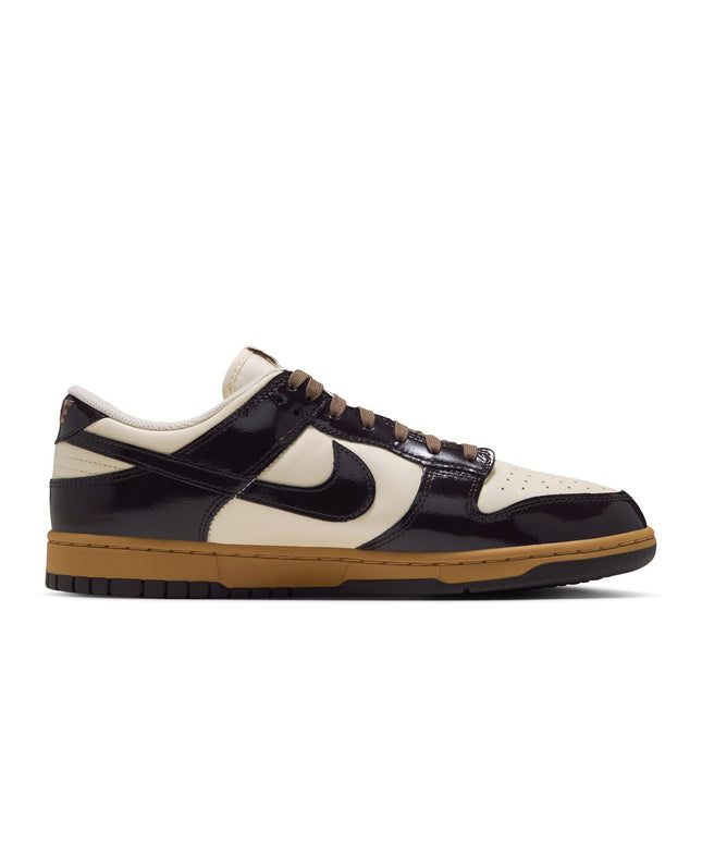 Nike Dunk Low Retro in shadow brown patent leather overlays, coconut milk base, and a gum brown rubber outsole.