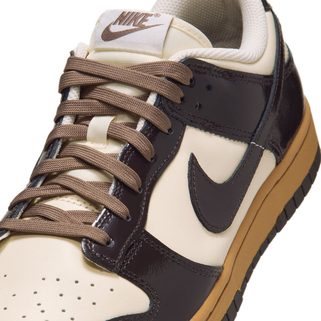 Nike Dunk Low Retro in shadow brown patent leather overlays, coconut milk leather panels, and a gum rubber sole.