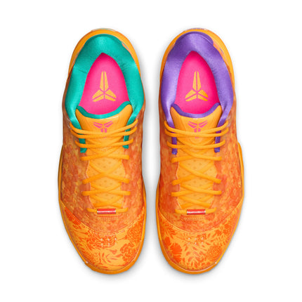 Top-down view of Nike Kobe Protro 3 sneakers in safety orange with floral patterns, mismatched teal and purple accents.