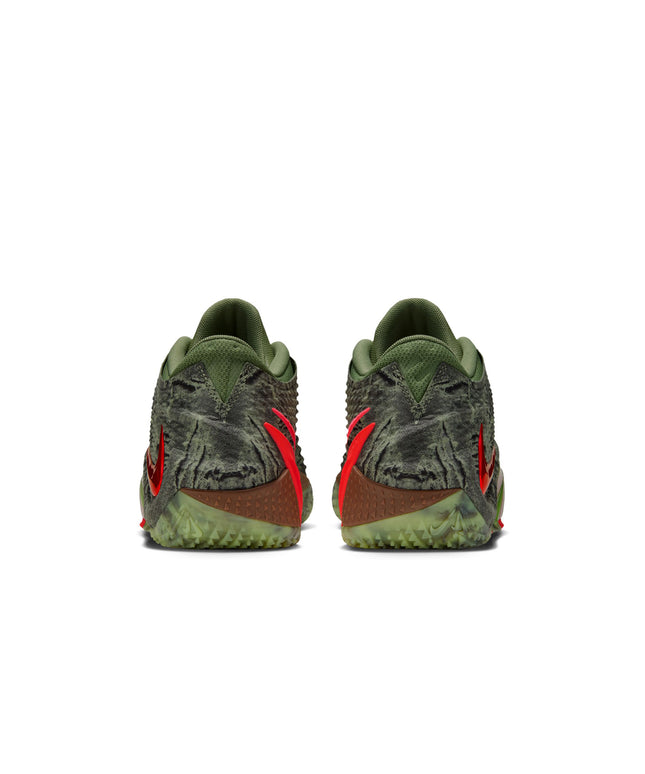 Back view of Nike Ja 4 Halloween sneakers in oil green featuring textured fabric uppers and bright orange Swooshes.