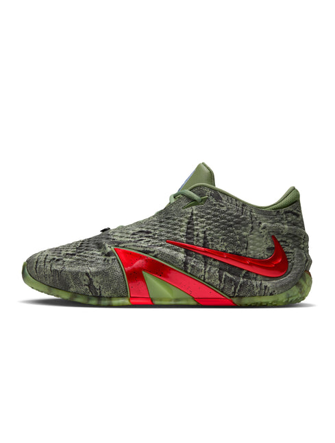 Nike Ja 4 Halloween sneaker in oil green textured material featuring a prominent shiny metallic red Nike Swoosh logo.