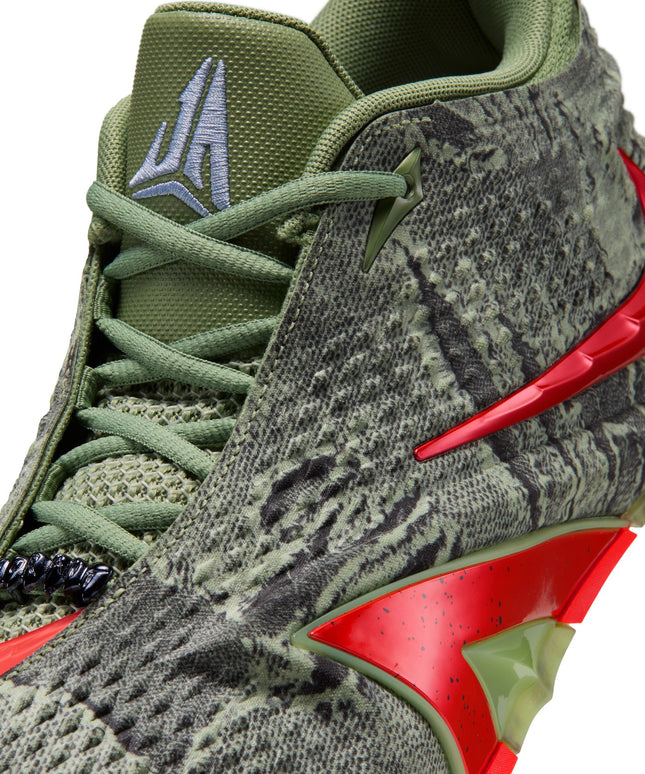 Nike Ja 4 Halloween basketball shoe in oil green textured knit with a metallic bright crimson swoosh and accents.