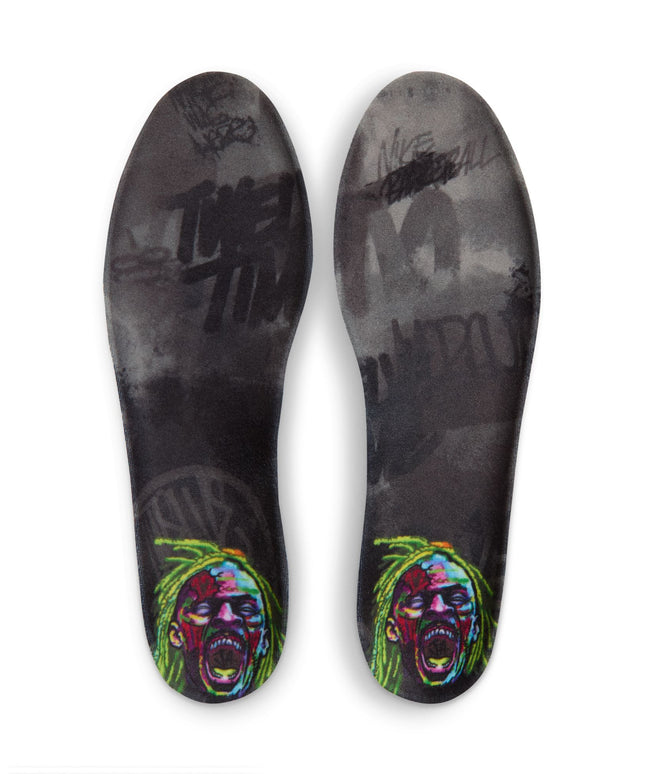 Pair of black Nike Ja 4 Halloween sneaker insoles featuring stylized neon green and crimson portraits at the heels.
