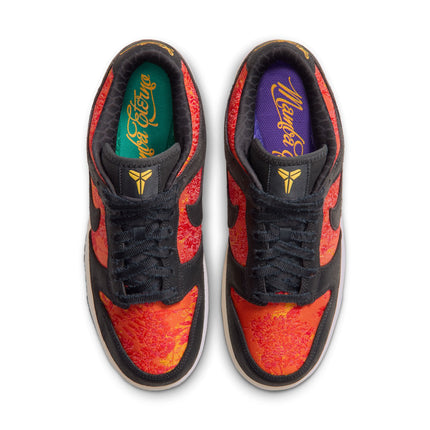Top-down view of Nike Dunk Low Protro sneakers featuring anthracite suede overlays and bright red floral fabric.