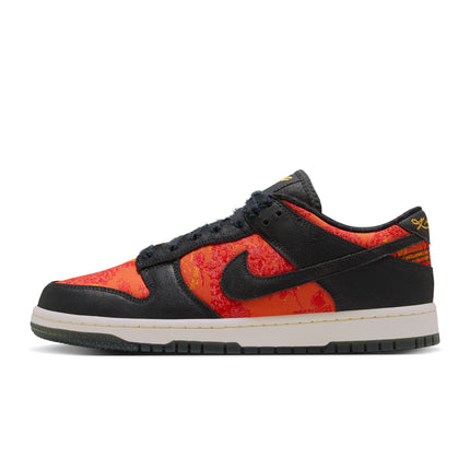 Nike Dunk Low Protro sneaker in black leather with vibrant orange patterned textile panels and a cream rubber outsole.