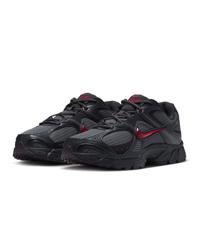 Nike V5 RNR running shoes in iron grey and dark smoke grey with tough red swoosh accents on a ripstop upper.