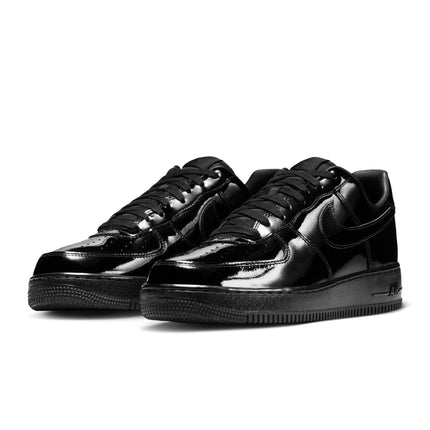 Nike Air Force 1 '07 sneakers featuring a sleek, glossy black patent leather upper and matching black rubber soles.