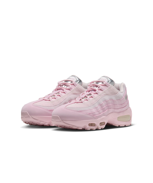 Nike Womens Air Max 95 Big Bubble sneakers in Pink Foam featuring smooth pink overlays, metallic silver tongue, and mesh.