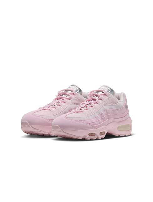 Nike Womens Air Max 95 Big Bubble sneakers in Pink Foam featuring smooth pink overlays, metallic silver tongue, and mesh.
