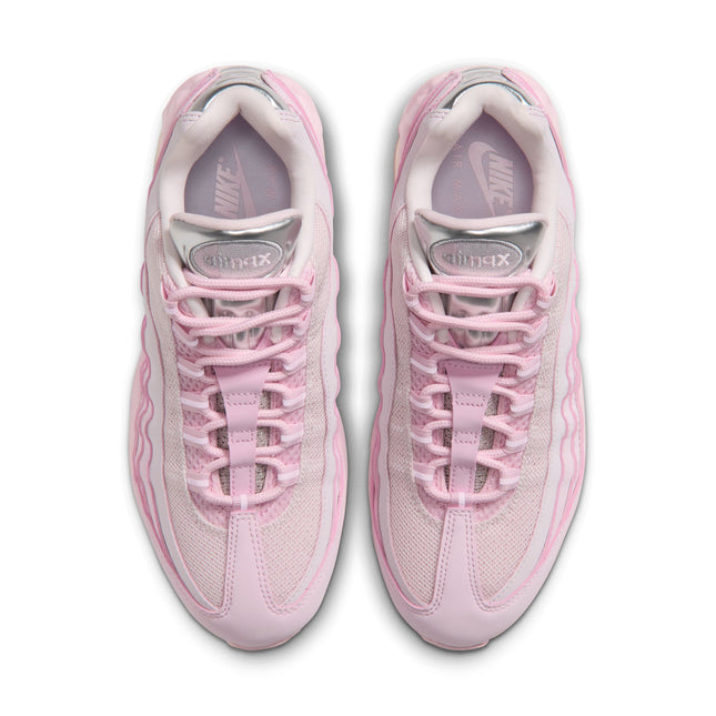 Top view of Nike Womens Air Max 95 Big Bubble sneakers in light pink foam with shiny metallic chrome tongue detailing.